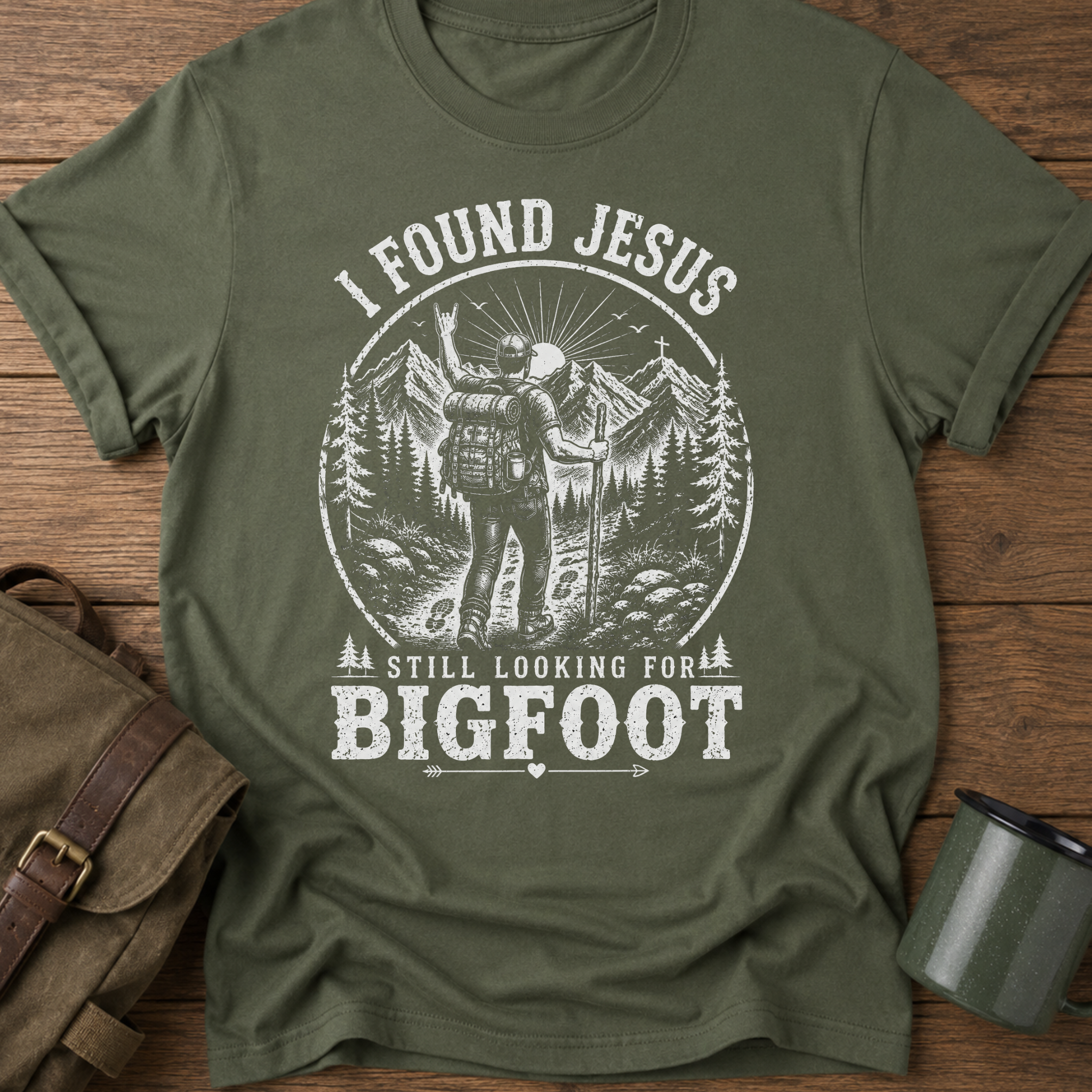I Found Jesus Still Looking For Bigfoot Funny Christian T-Shirt