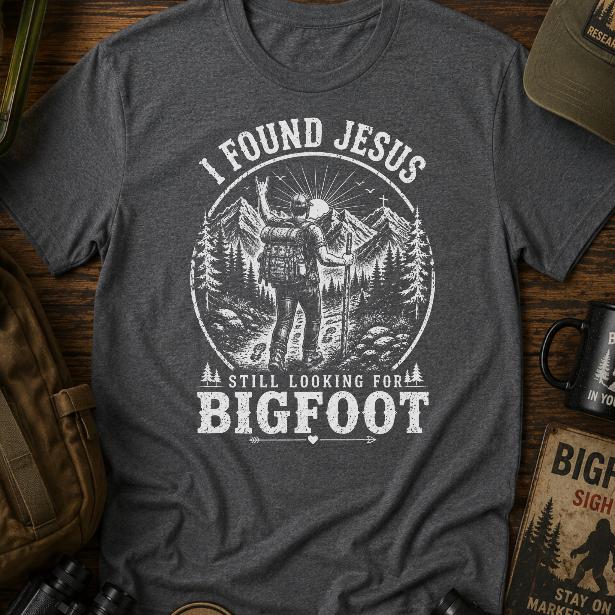 I Found Jesus Still Looking For Bigfoot Funny Christian T-Shirt